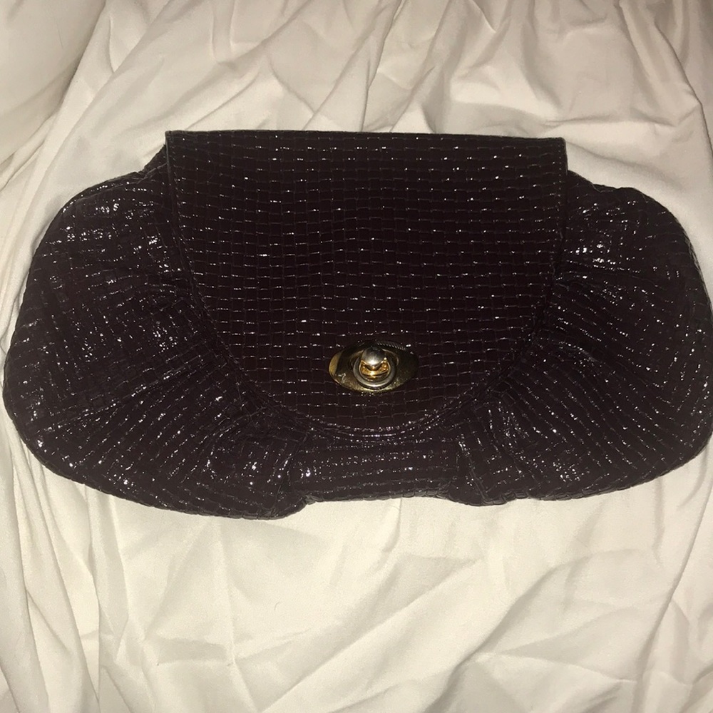 Goldenbleu braided leather clutch